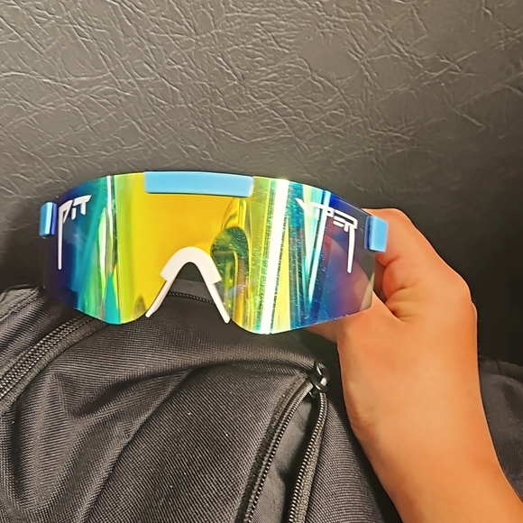 I am selling pit vipers. They are adjustable and they color is blue and white